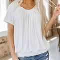 Casual women's top with pleated V-neck and short sleeves